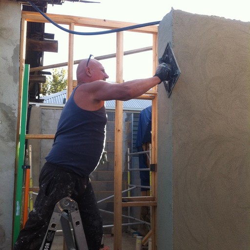 John Di Vecchio plastering and rendering a wall